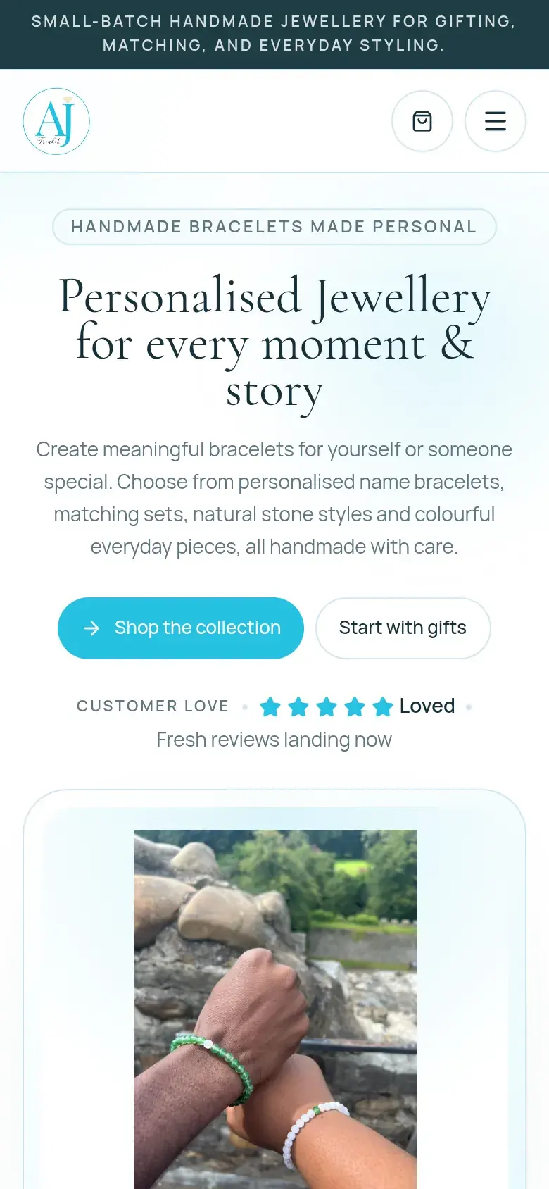 AJ Trinkets homepage on a phone